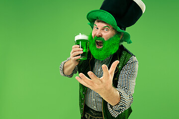 Image showing A man in a leprechaun hat at studio. He celebrates St. Patrick\'s Day.