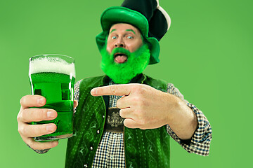 Image showing A man in a leprechaun hat at studio. He celebrates St. Patrick\'s Day.