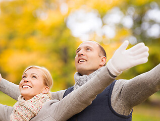 Image showing smiling couple in autumn park