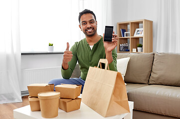 Image showing indian man using smartphone for food delivery