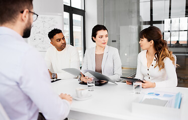 Image showing recruiters having job interview with employee