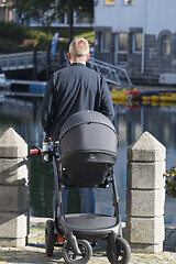 Image showing Dad with Pram