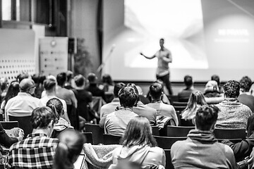 Image showing Business speaker giving a talk at business conference event.