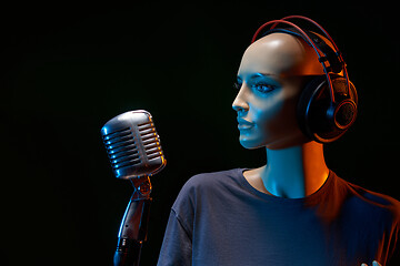 Image showing Mannequin with studio retro condenser microphone and professional headphones