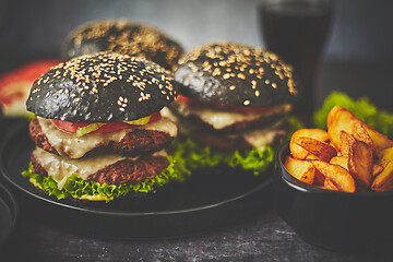 Image showing Double beef burger with vegetables and cheese