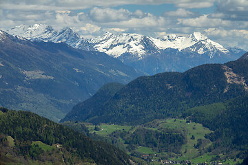 Image showing Snow mountains and village in Switzerland