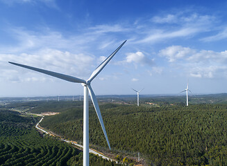 Image showing Windmills or wind turbine on wind farm