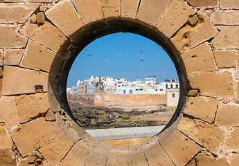 Image showing View of Essaouira through hole in wall