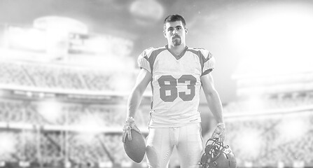 Image showing American Football Player isolated on big modern stadium field