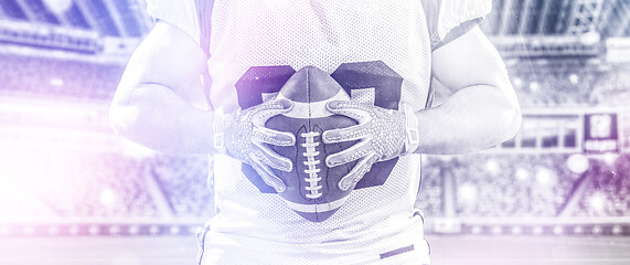 Image showing closeup American Football Player isolated on big modern stadium