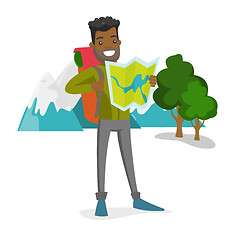 Image showing African traveler with backpack looking at map.