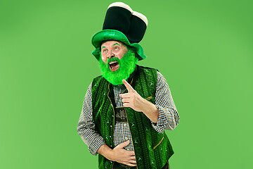 Image showing A man in a leprechaun hat at studio. He celebrates St. Patrick\'s Day.