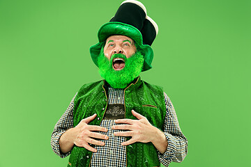 Image showing A man in a leprechaun hat at studio. He celebrates St. Patrick\'s Day.