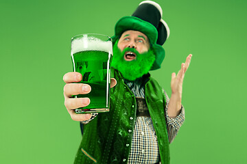 Image showing A man in a leprechaun hat at studio. He celebrates St. Patrick\'s Day.