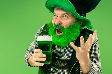 Image showing A man in a leprechaun hat at studio. He celebrates St. Patrick\'s Day.