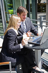 Image showing Caucasian business people having discussion