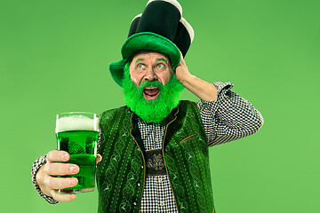 Image showing A man in a leprechaun hat at studio. He celebrates St. Patrick\'s Day.