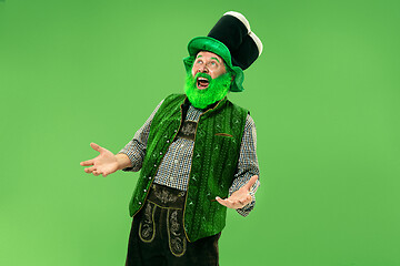 Image showing A man in a leprechaun hat at studio. He celebrates St. Patrick\'s Day.