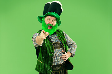 Image showing A man in a leprechaun hat at studio. He celebrates St. Patrick\'s Day.