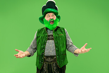 Image showing A man in a leprechaun hat at studio. He celebrates St. Patrick\'s Day.