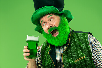 Image showing A man in a leprechaun hat at studio. He celebrates St. Patrick\'s Day.