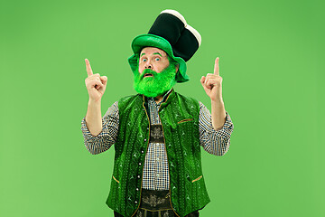 Image showing A man in a leprechaun hat at studio. He celebrates St. Patrick\'s Day.