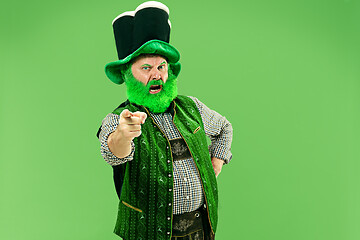 Image showing A man in a leprechaun hat at studio. He celebrates St. Patrick\'s Day.