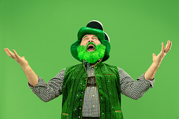 Image showing A man in a leprechaun hat at studio. He celebrates St. Patrick\'s Day.