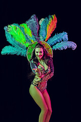 Image showing Beautiful young woman in carnival peacock costume