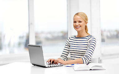 Image showing student woman with laptop and book