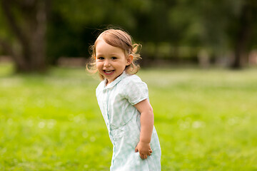 Image showing happy little baby girl at park in summer