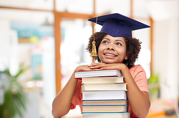 Image showing african american graduate student with books