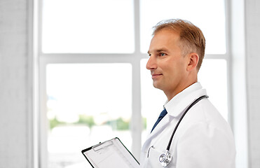 Image showing smiling doctor in white coat at hospital