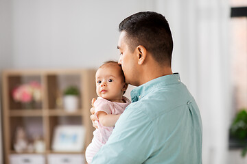 Image showing middle aged father with baby daughter at home