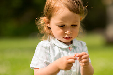 Image showing happy little girl at park in summer