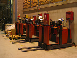 Image showing Parked forklifts