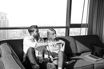 Image showing Young couple watching television