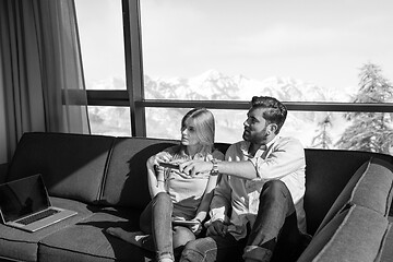 Image showing Young couple watching television