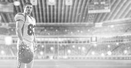 Image showing American Football Player isolated on big modern stadium field