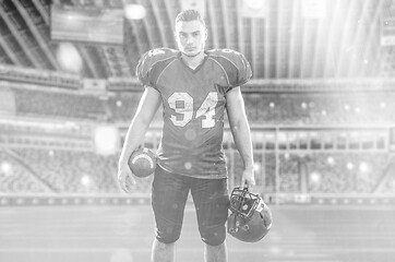 Image showing American Football Player isolated on big modern stadium field