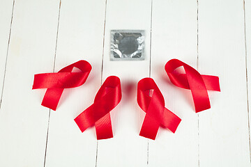 Image showing Aids Awareness Sign Red Ribbon. World Aids Day concept.