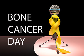 Image showing Yellow ribbon symbolic color for Sarcoma Bone cancer awareness and suicide prevention