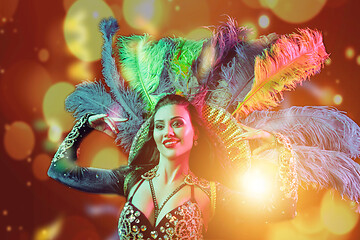 Image showing Beautiful young woman in carnival peacock costume