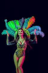 Image showing Beautiful young woman in carnival peacock costume