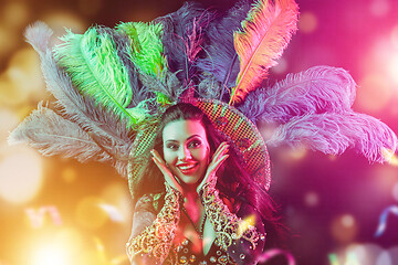 Image showing Beautiful young woman in carnival peacock costume