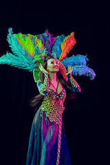 Image showing Beautiful young woman in carnival peacock costume