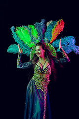 Image showing Beautiful young woman in carnival peacock costume