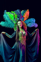 Image showing Beautiful young woman in carnival peacock costume