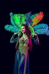 Image showing Beautiful young woman in carnival peacock costume