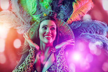 Image showing Beautiful young woman in carnival peacock costume